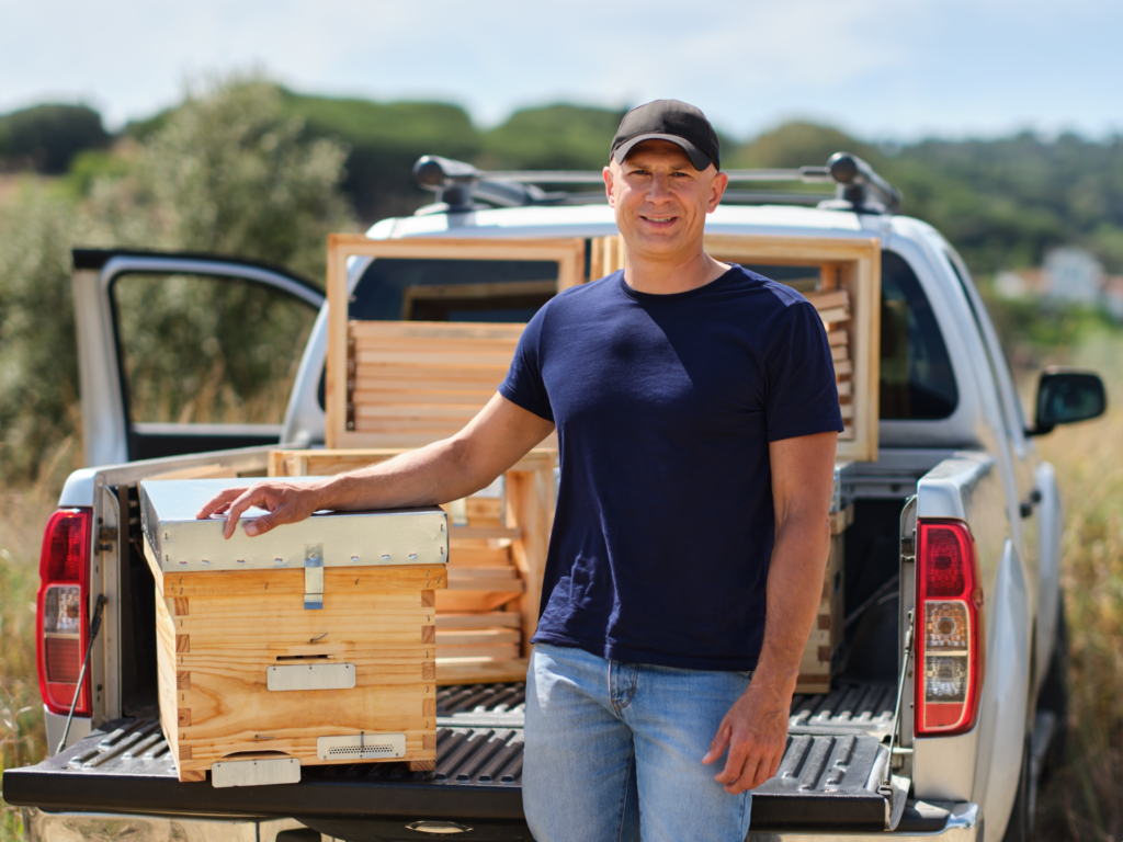 Man beekeeper with new hives